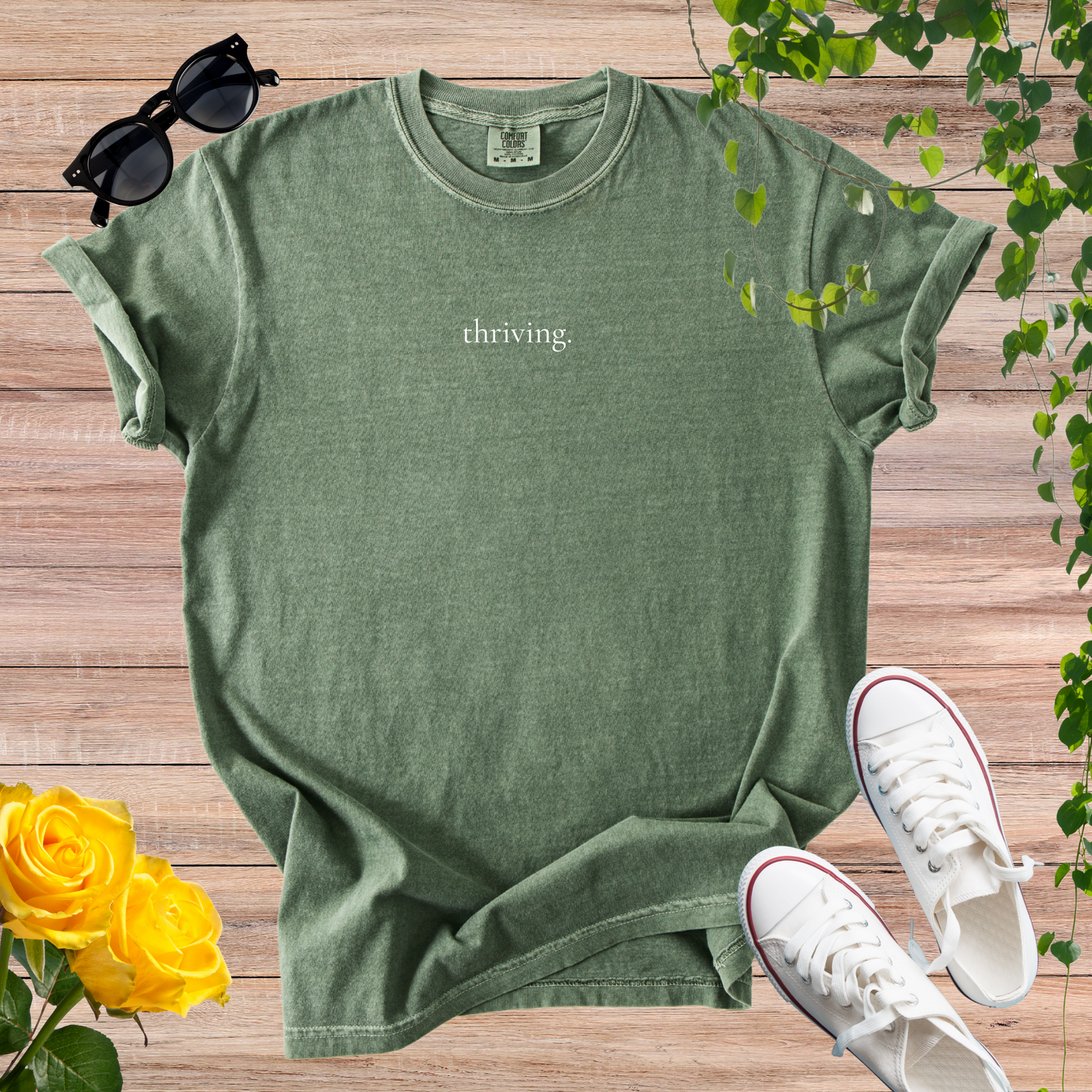 thriving. T-Shirt